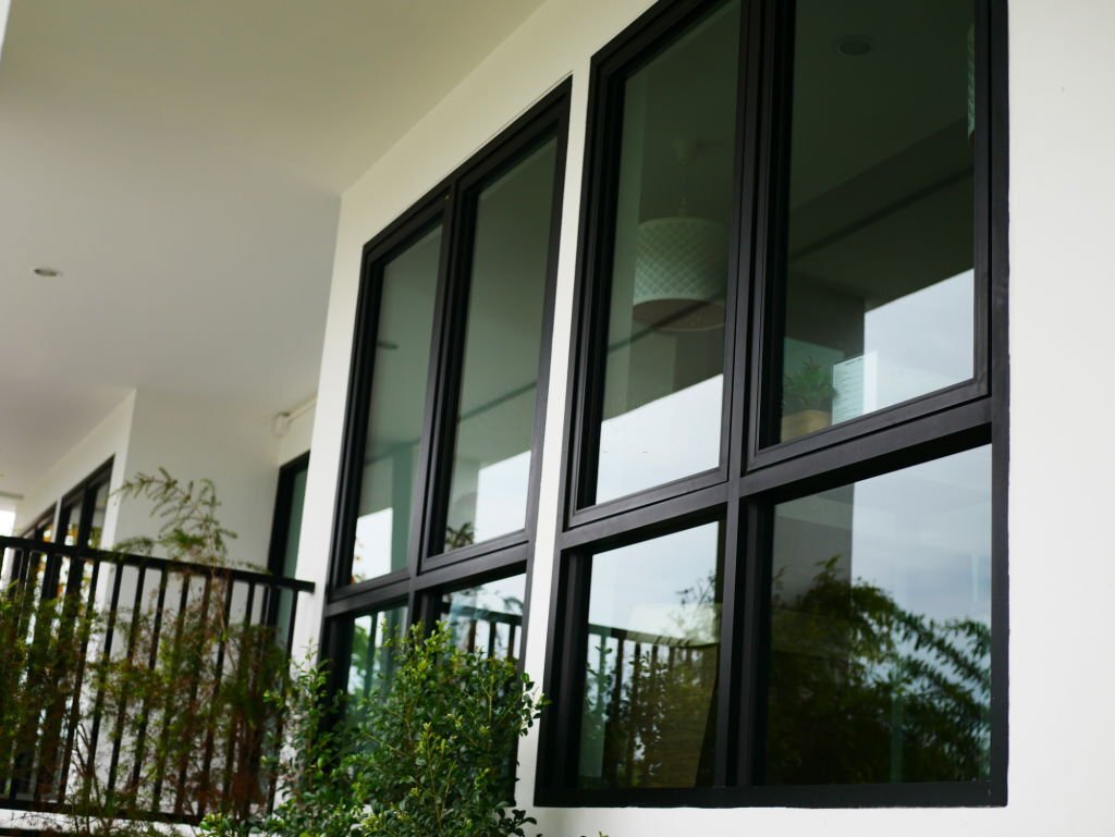 Residential glass with privacy tint reflecting exterior light